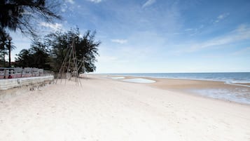 On the beach, white sand