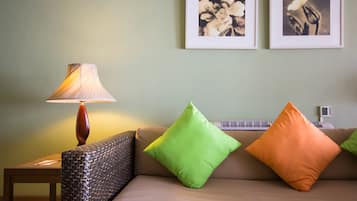 Honeymoon Suite, 1 King Bed, River View | Living area | TV, DVD player