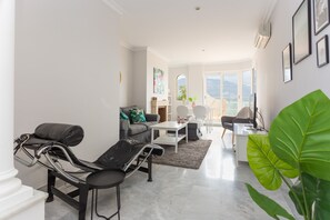 Apartment, 2 Bedrooms | Living room | Flat-screen TV