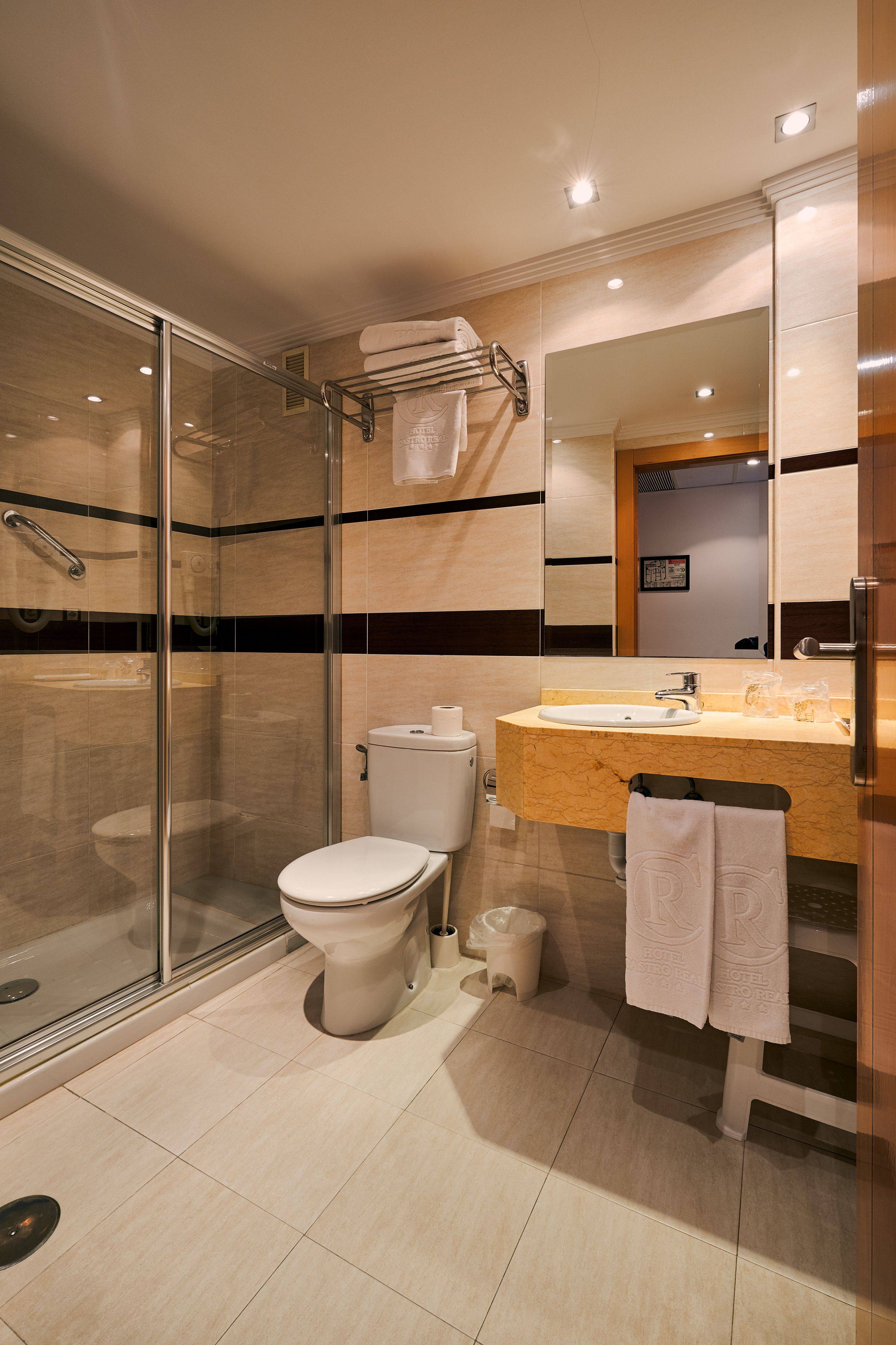 shower, free toiletries, hair dryer, towels