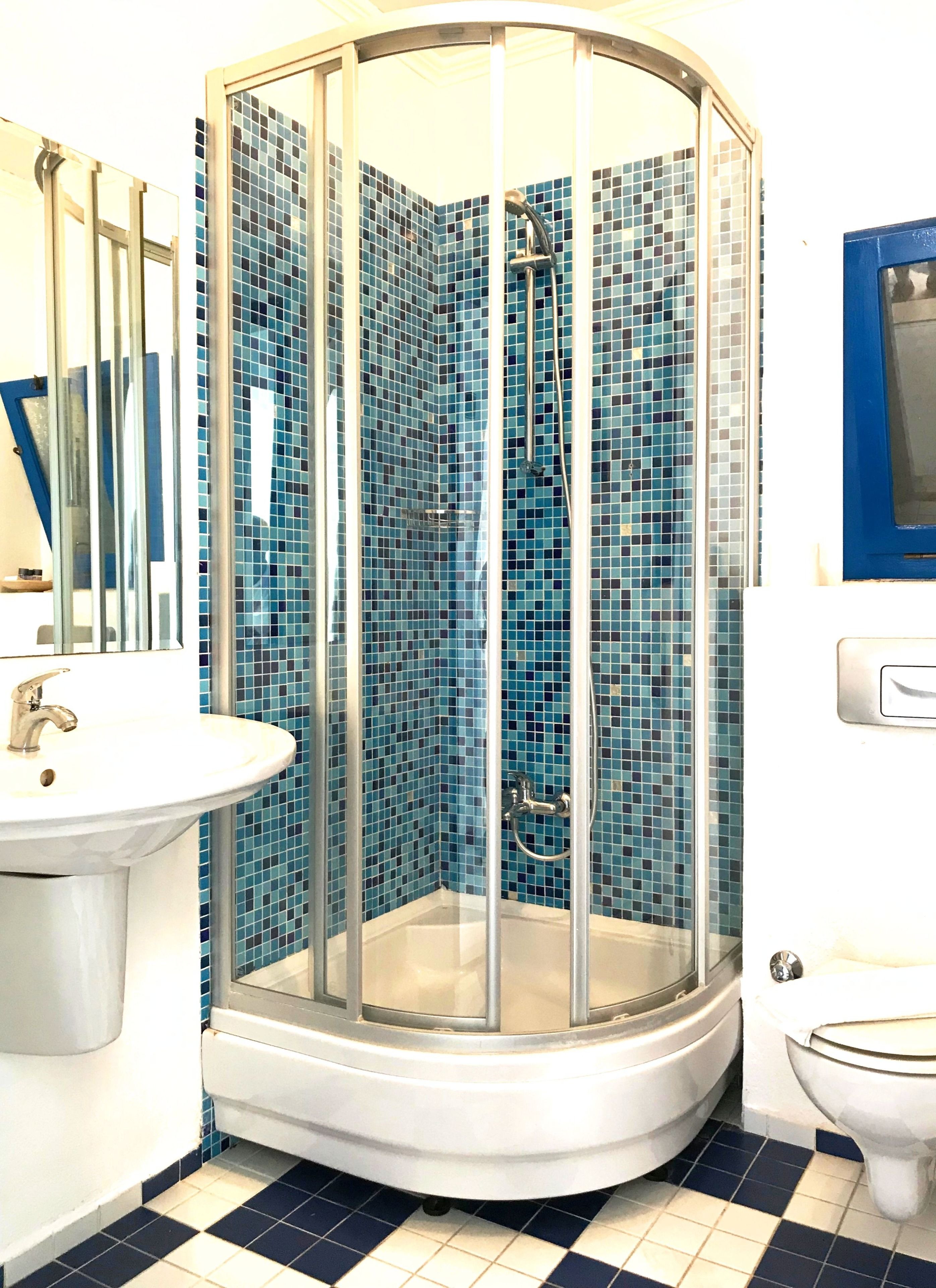 superior twin room | bathroom | shower, free toiletries, hair dryer, slippers