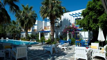 Seasonal outdoor pool, pool umbrellas, sun loungers