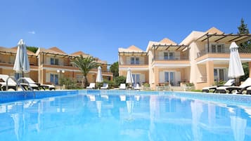 Seasonal outdoor pool, pool umbrellas, sun loungers