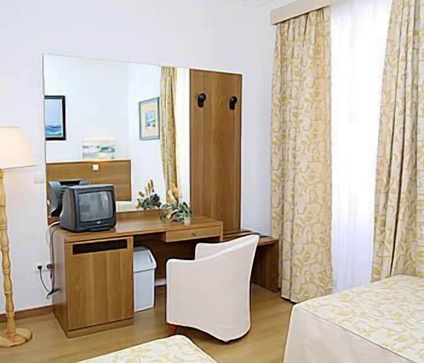 Desk, free cots/infant beds, rollaway beds, bed sheets