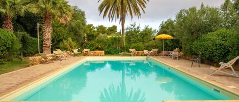 Seasonal outdoor pool, pool umbrellas, sun loungers