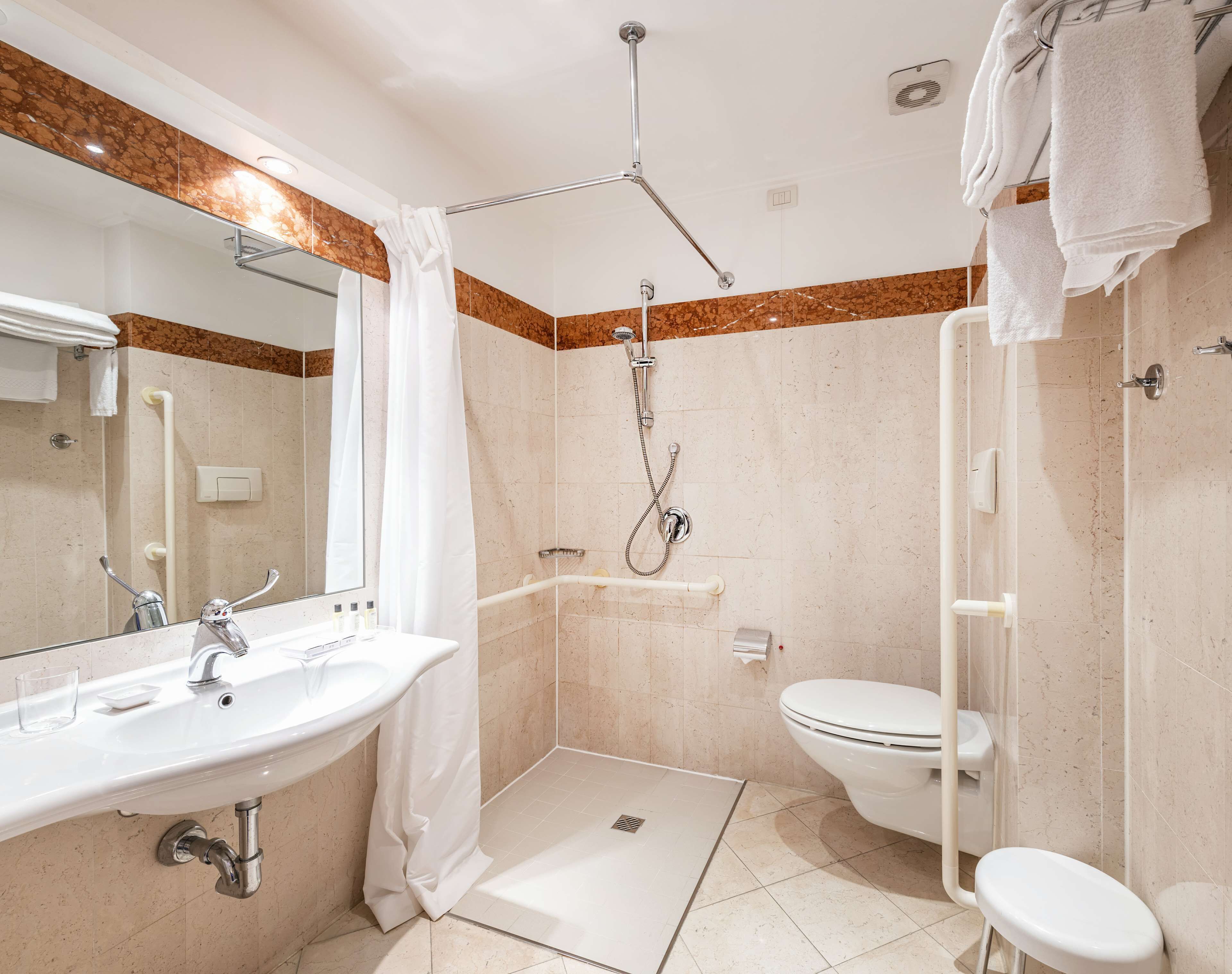 economy room, 1 queen bed, accessible, non smoking | accessible bathroom