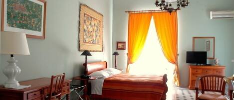 Frette Italian sheets, premium bedding, down duvets, minibar