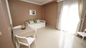 Suite junior | Área de sala de estar | Televisión