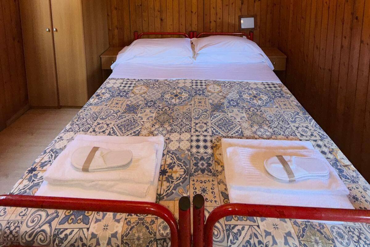 Coffres-forts dans les chambres, Wi-Fi gratuit, draps fournis