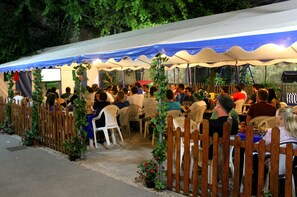 Breakfast, lunch served; international cuisine, al fresco dining 