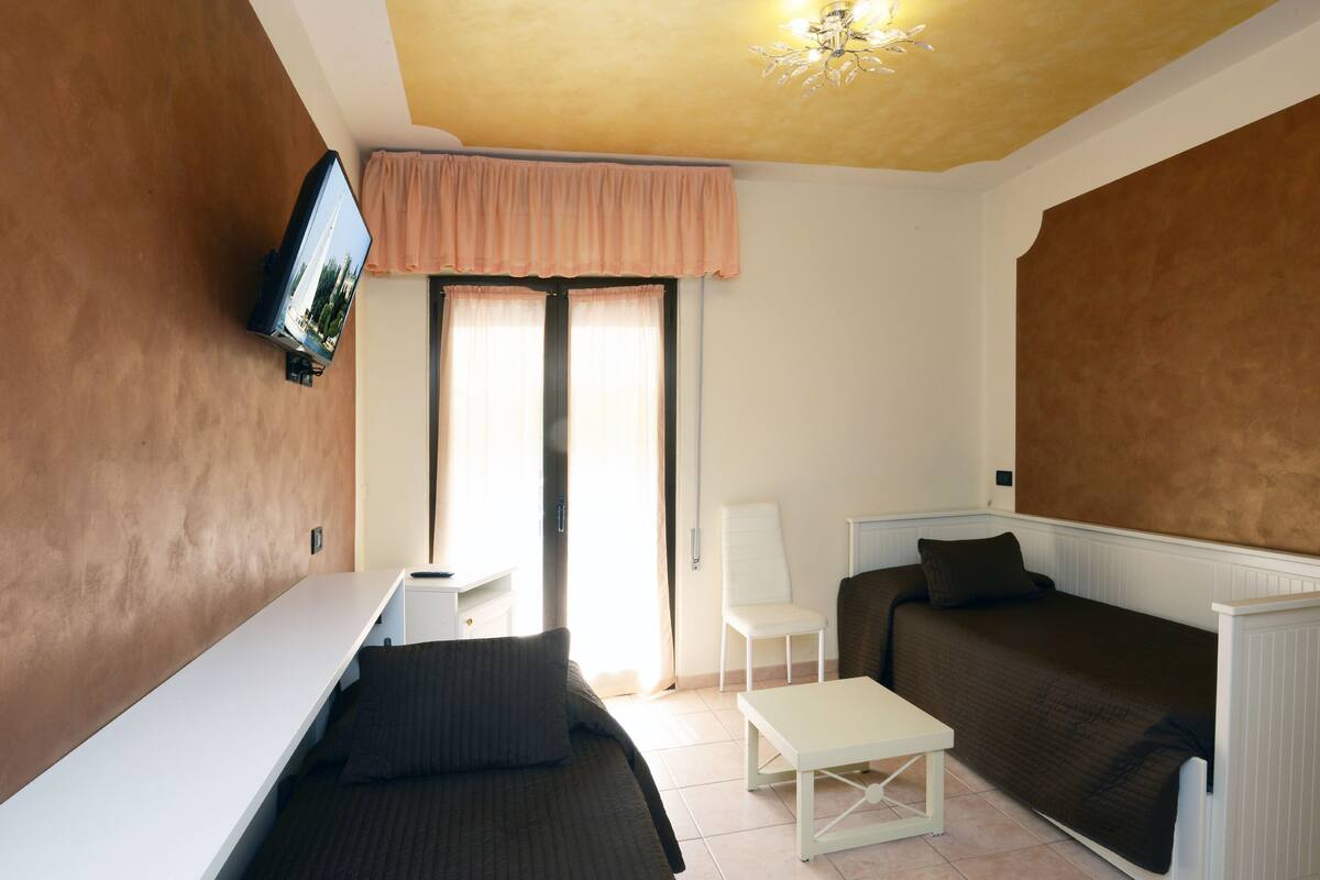 Quadruple Room, Balcony | Memory foam beds, in-room safe, desk, soundproofing