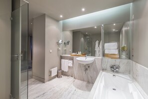 Suite | Bathroom | Bathtub, hair dryer, bathrobes, bidet