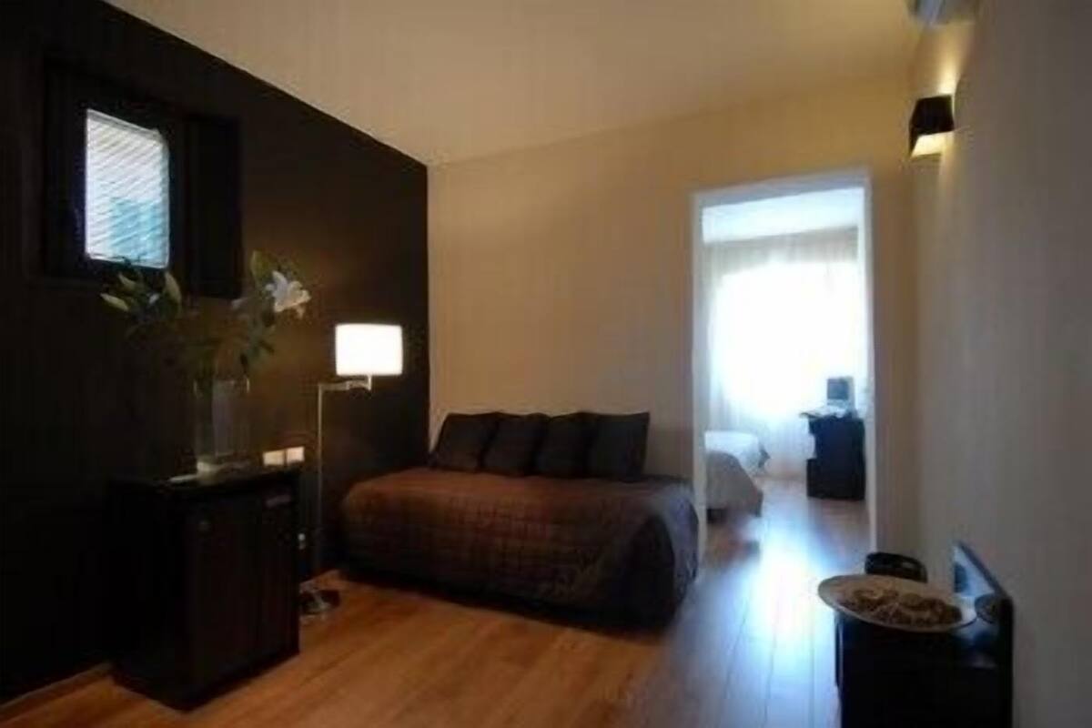 Quadruple Room | Living room