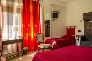 Triple Room (external private bathroom) | Desk, iron/ironing board, free WiFi, bed sheets