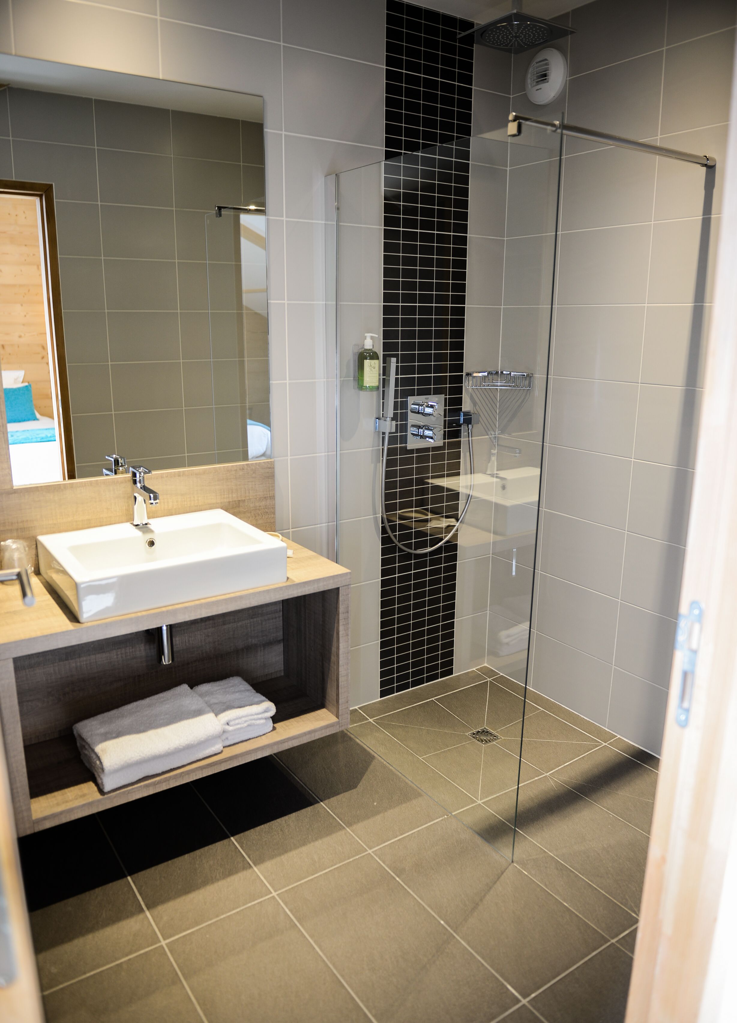 shower, free toiletries, hair dryer, towels