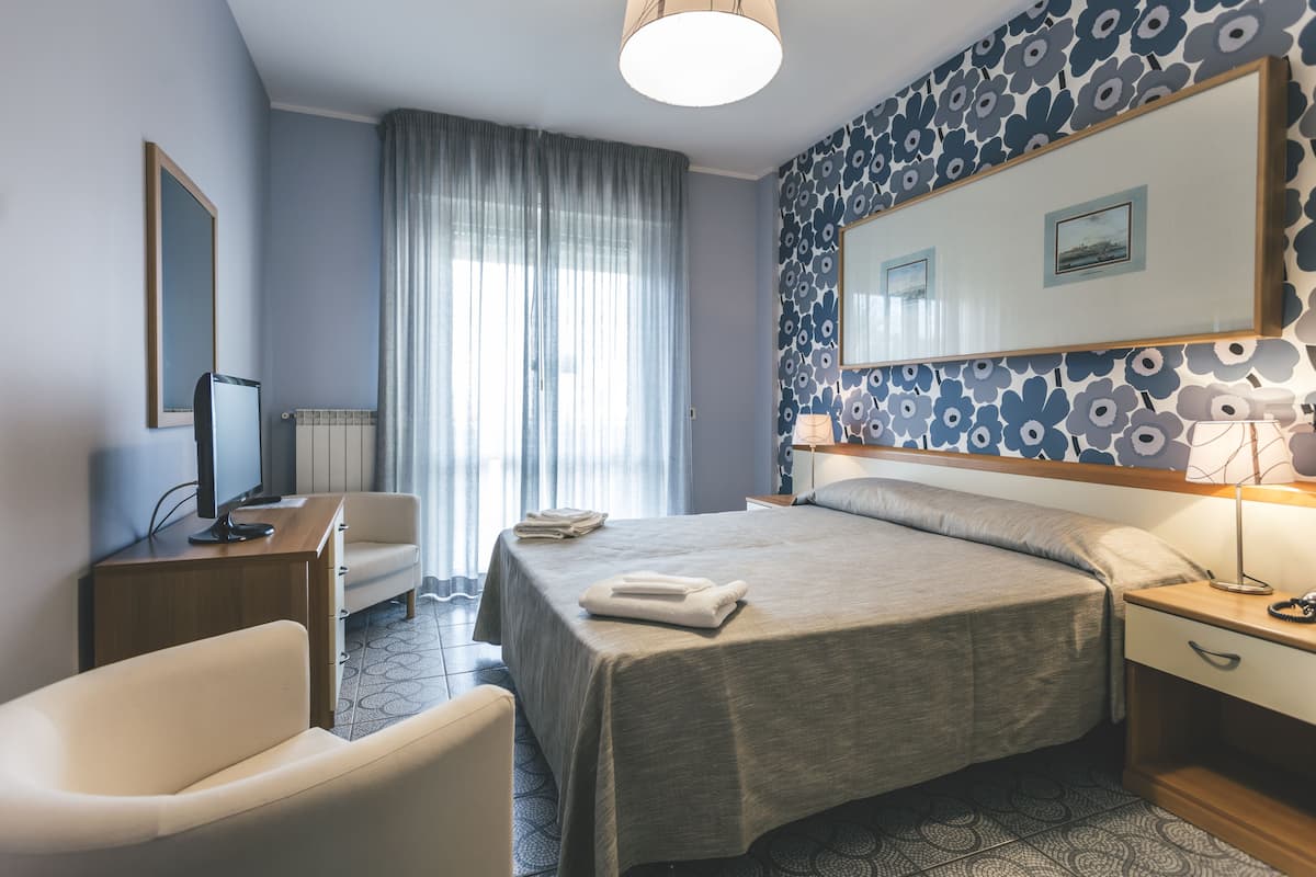 Select Comfort beds, minibar, in-room safe, desk