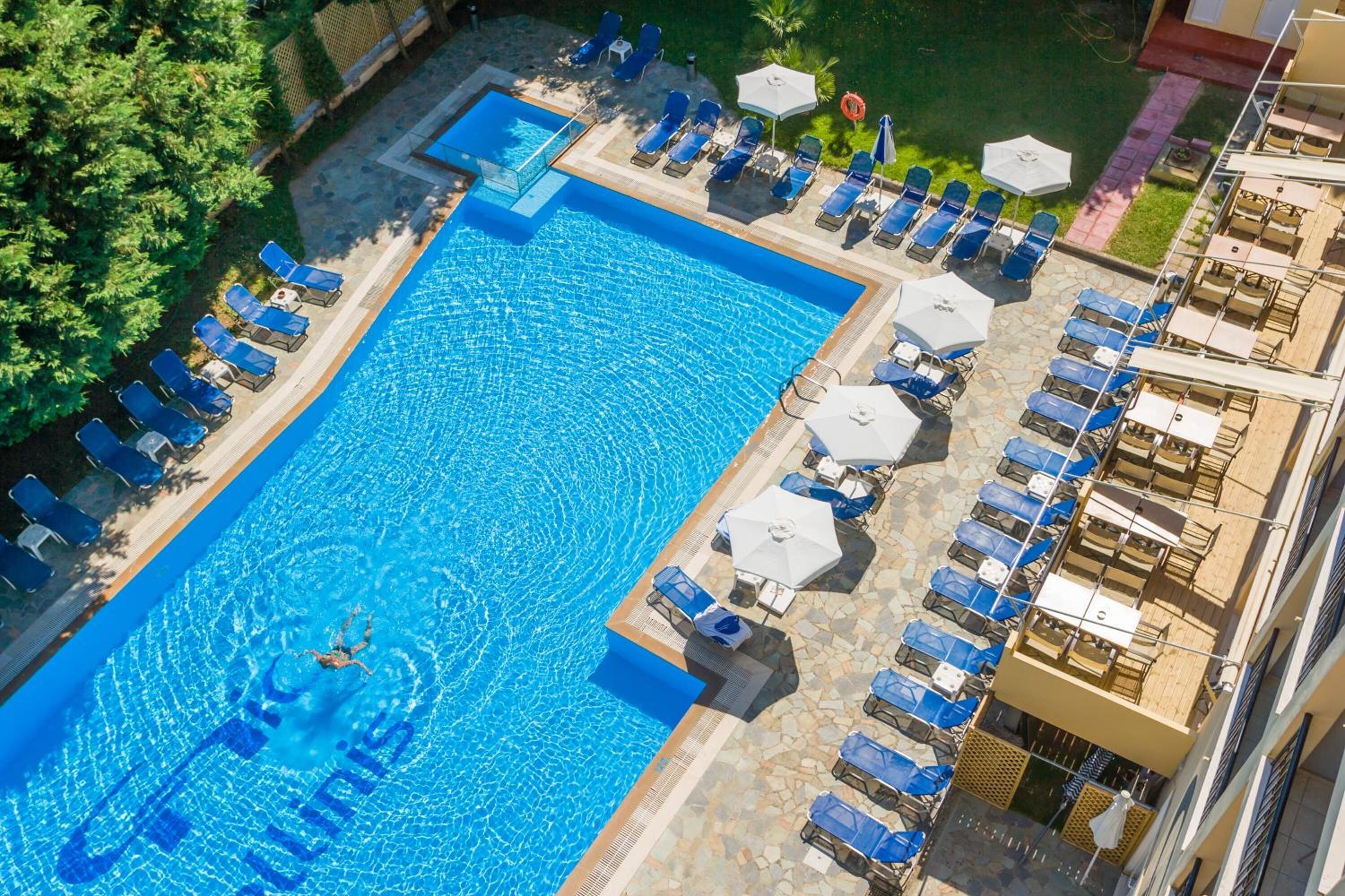 outdoor pool, pool umbrellas, pool loungers