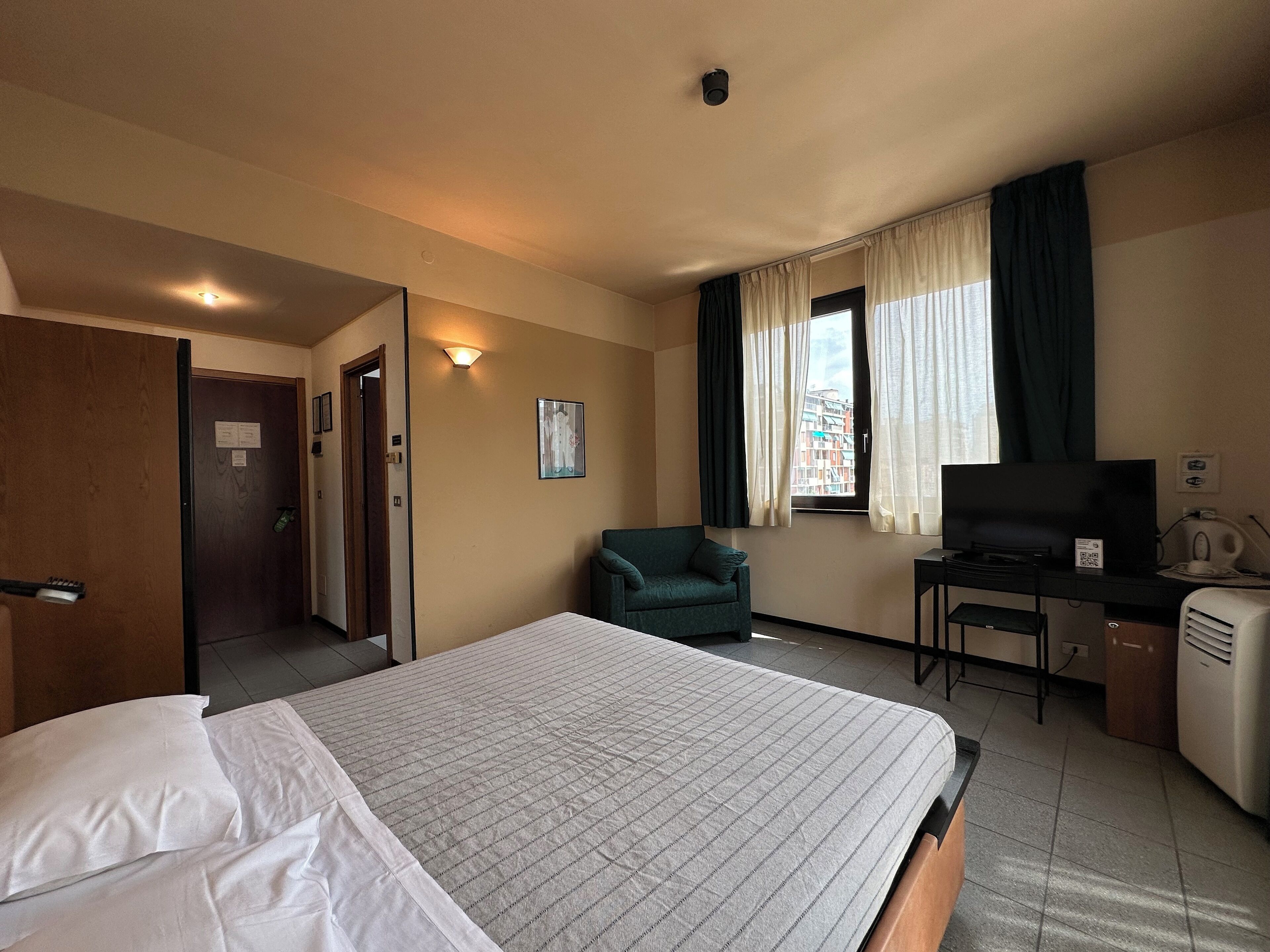 individually decorated, individually furnished, desk, blackout curtains