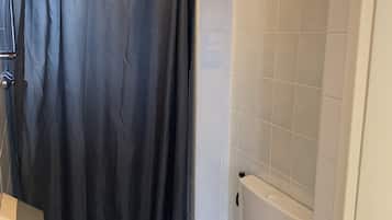 Shower, rainfall showerhead, free toiletries, hair dryer