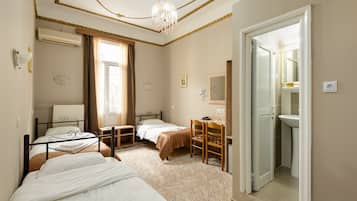 Standard Triple Room | Minibar, in-room safe, desk, soundproofing