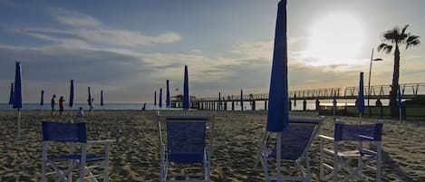 Sun loungers, beach umbrellas