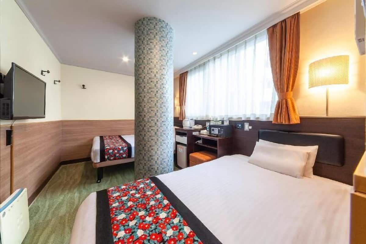 Premium bedding, memory-foam beds, in-room safe, desk