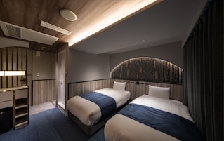 Premium bedding, memory-foam beds, in-room safe, desk
