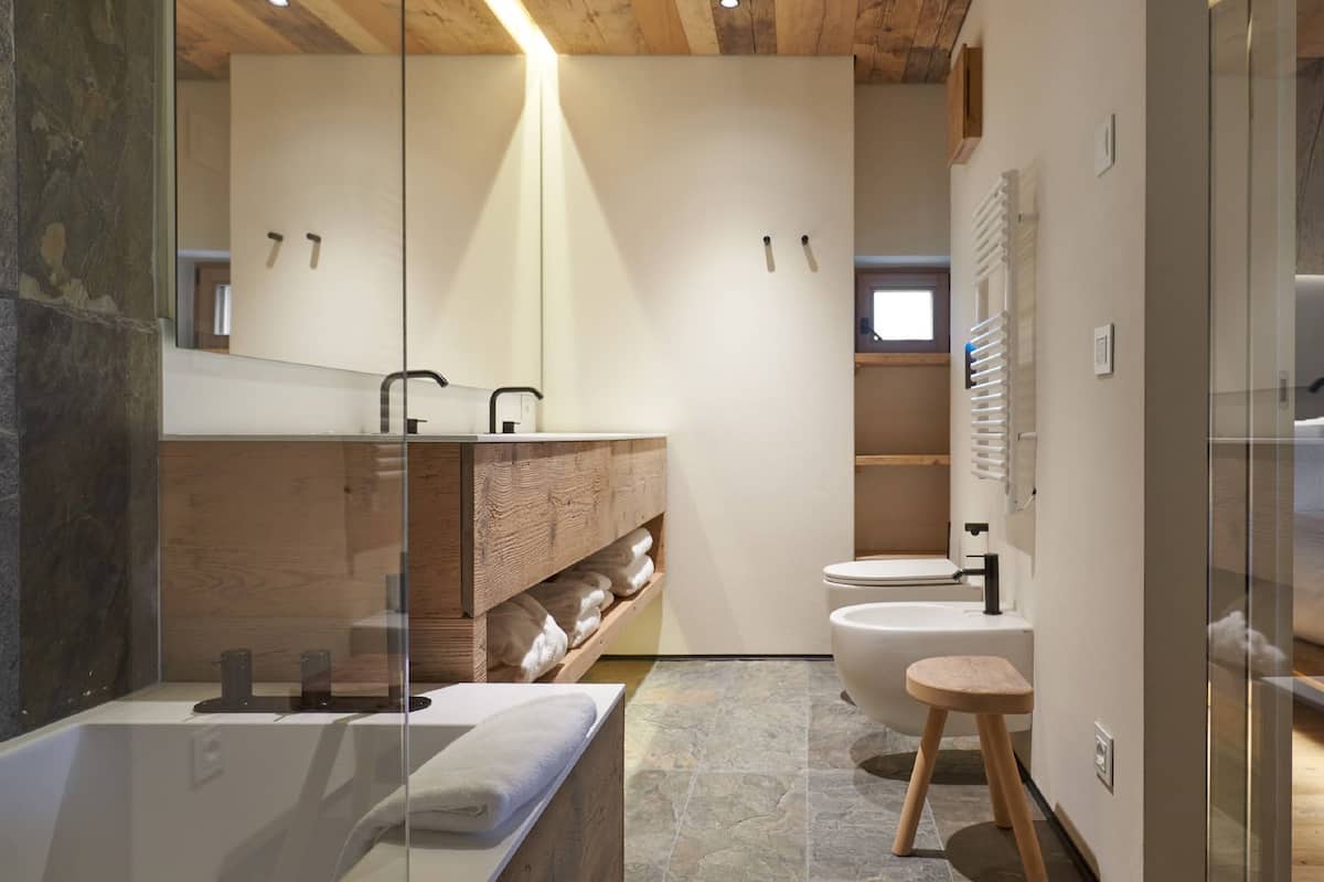 junior studio suite | bathroom | free toiletries, hair dryer, bathrobes, slippers