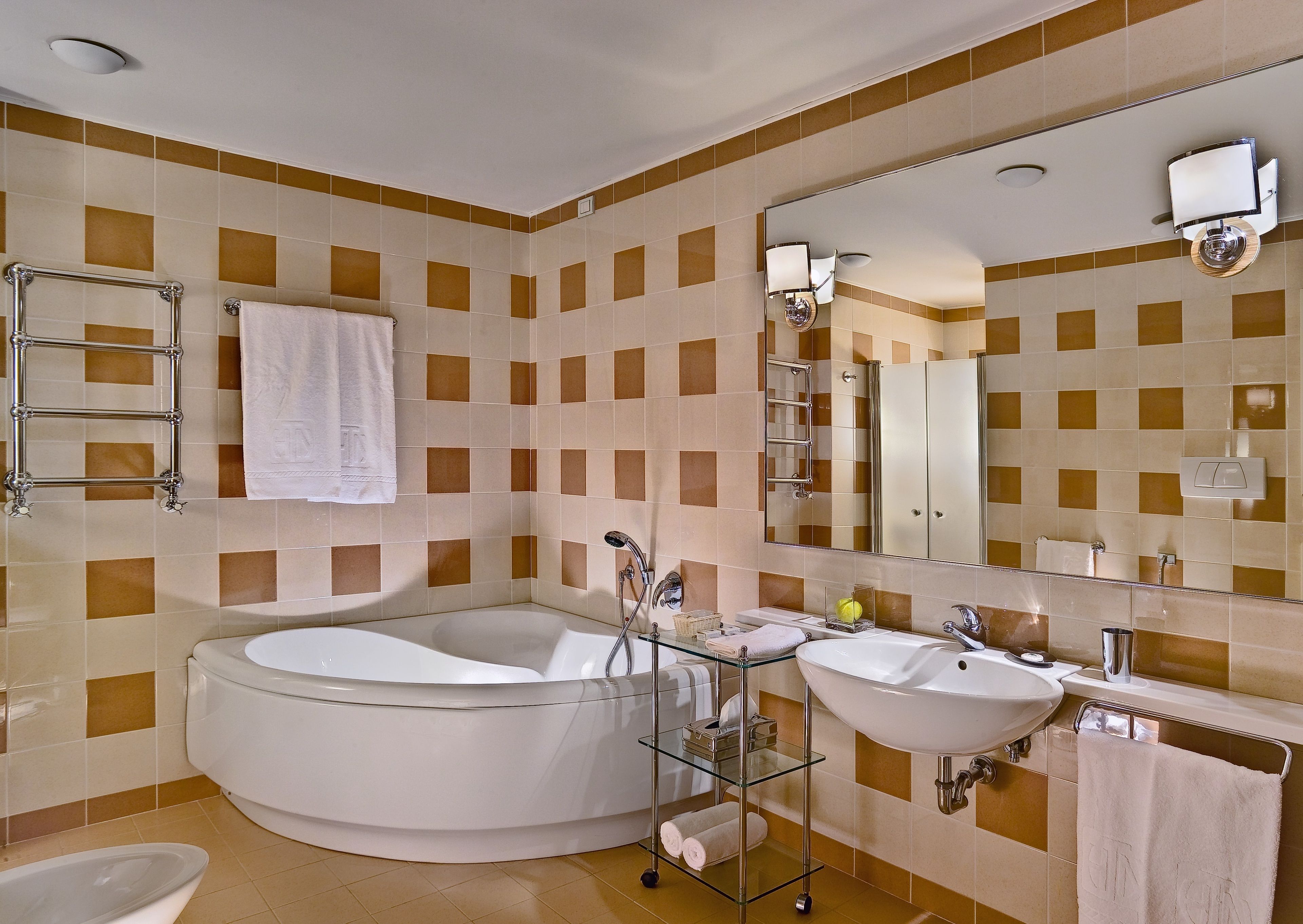 junior suite | bathroom | hair dryer, bathrobes, slippers, bidet