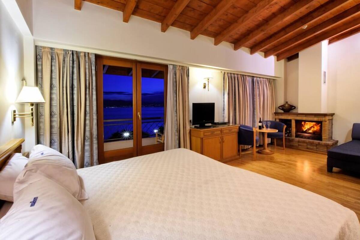 Junior Suite, Fireplace, Sea View | Premium bedding, down comforters, minibar, in-room safe