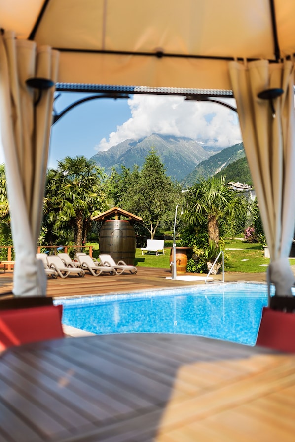 2 outdoor pools, pool umbrellas, pool loungers