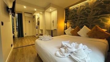 Quarto premium | Roupas de cama premium, edredons de pluma, camas Select Comfort