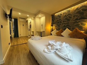 Quarto premium | Roupas de cama premium, edredons de pluma, camas Select Comfort
