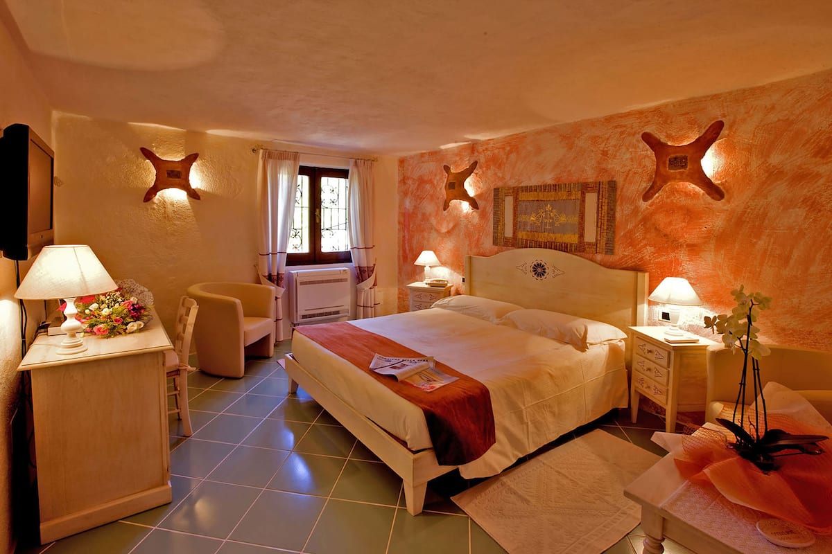 Family Room, Balcony, Sea View | 1 bedroom, down duvets, minibar, in-room safe