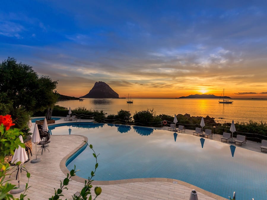 2 outdoor pools, pool umbrellas, pool loungers