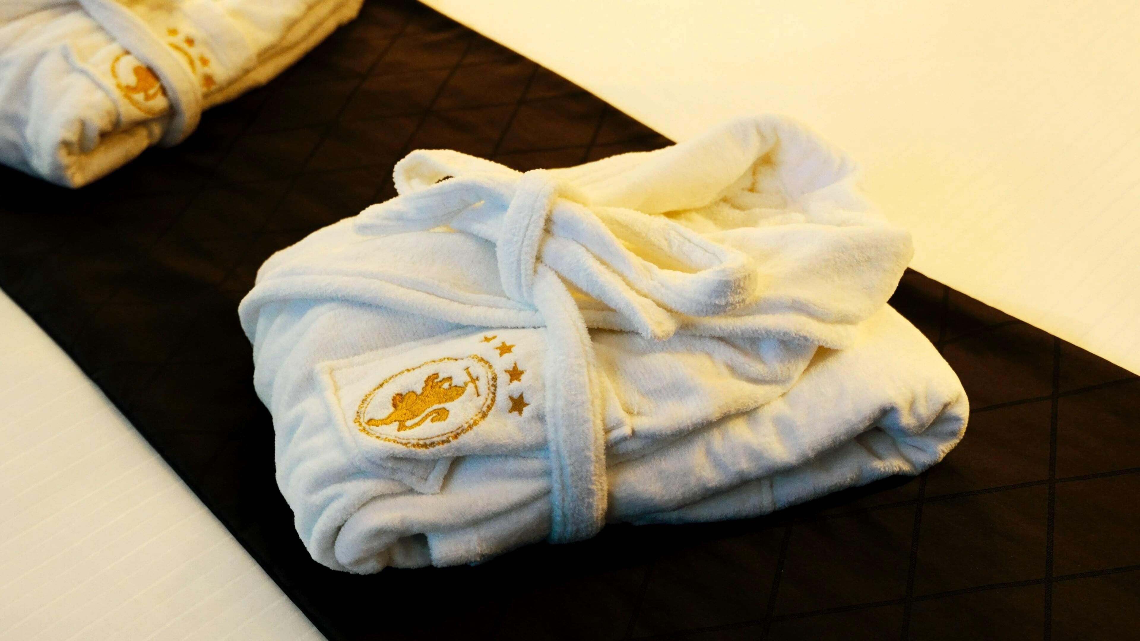 elite studio suite | bathroom | rainfall showerhead, hair dryer, bidet, towels