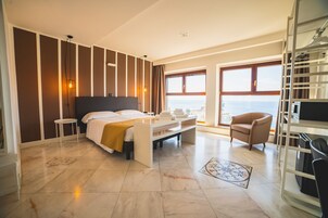 Junior Suite, Sea View | Minibar, desk, blackout drapes, soundproofing