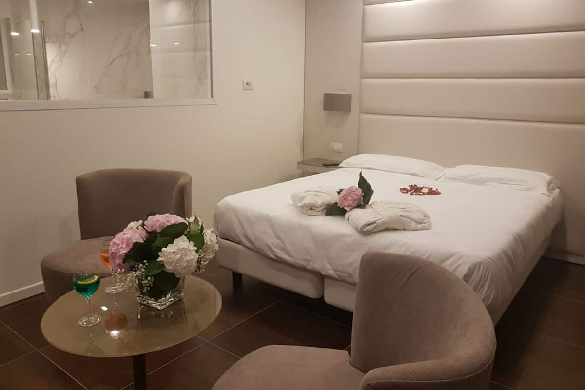 1 Schlafzimmer, hochwertige Bettwaren, Minibar, Zimmersafe