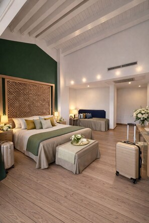 Executive Triple Room | Premium bedding, minibar, in-room safe, individually decorated