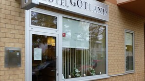 A hotel entrance with a sign reading "City Hotel Gotland." - City Hotel Gotland (Berlin)