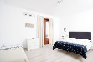 Apartment, 2 Bedrooms | Premium bedding, individually decorated, iron/ironing board, free WiFi
