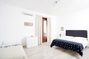 Apartment, 2 Bedrooms | Premium bedding, individually decorated, iron/ironing board, free WiFi