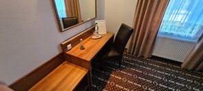 Individually furnished, desk, cots/infant beds, rollaway beds