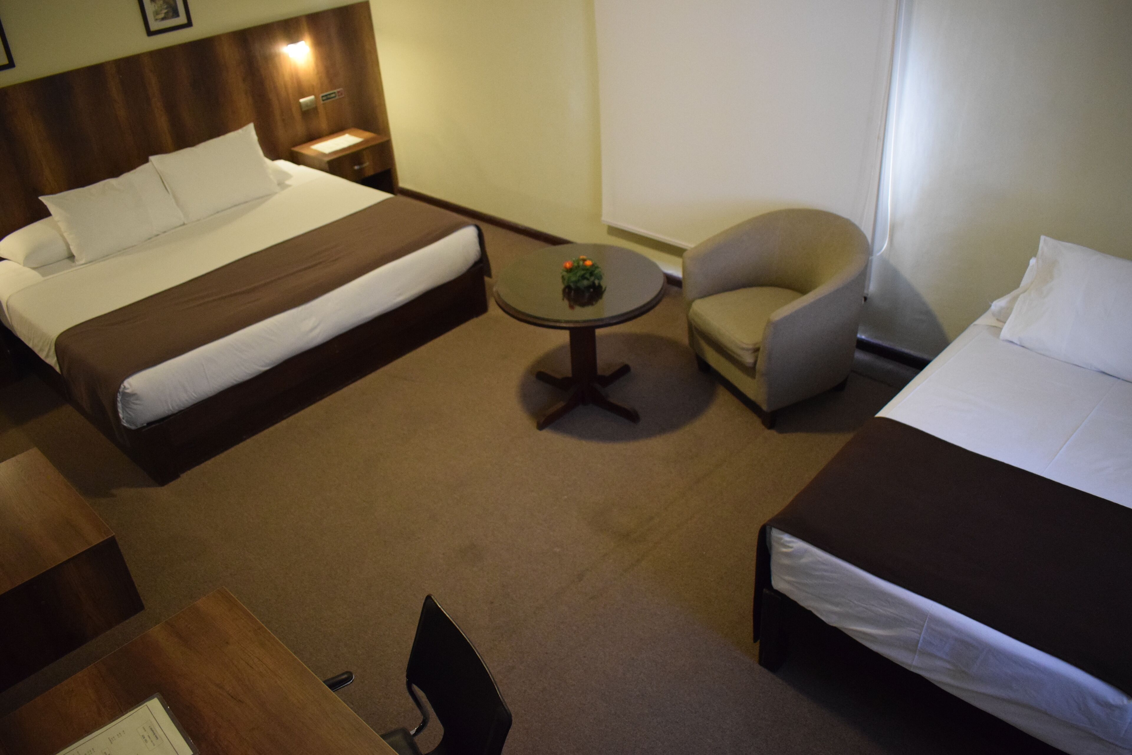 triple room, garden view, garden area | down duvets, minibar, in-room safe, individually decorated