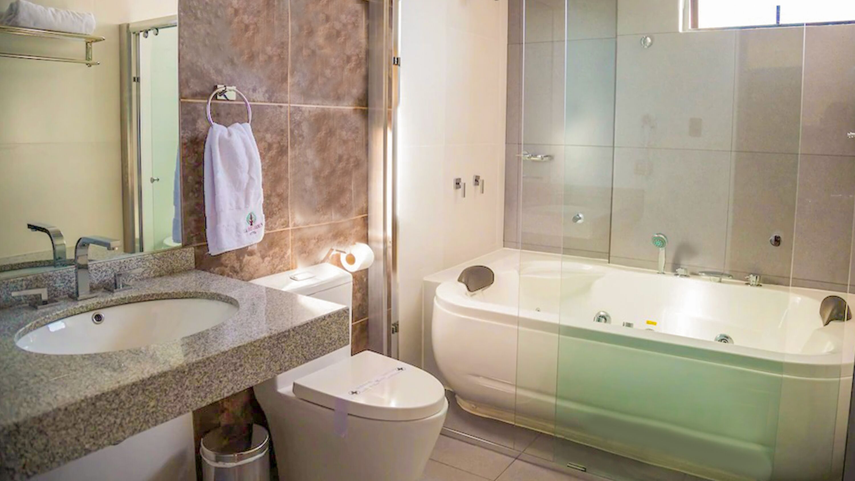 studio suite, garden view, garden area | bathroom | shower, free toiletries, hair dryer, towels