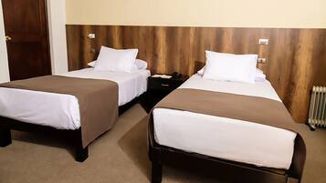 Standard Twin Room | Down comforters, minibar, in-room safe, individually decorated