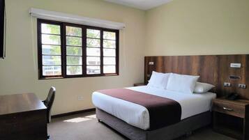 Economy Single Room | Down comforters, minibar, in-room safe, desk