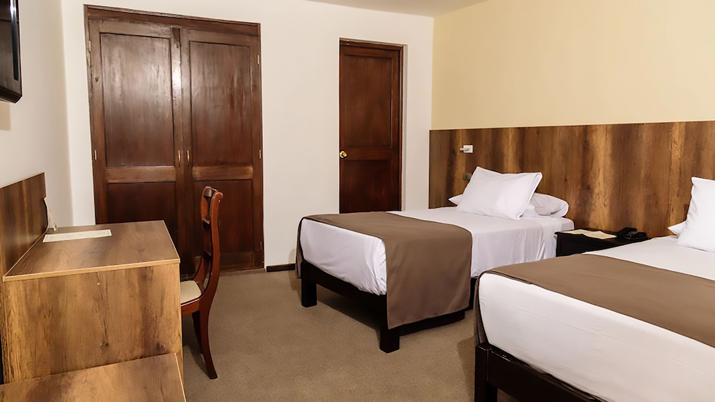 standard twin room | down duvets, minibar, in-room safe, individually decorated