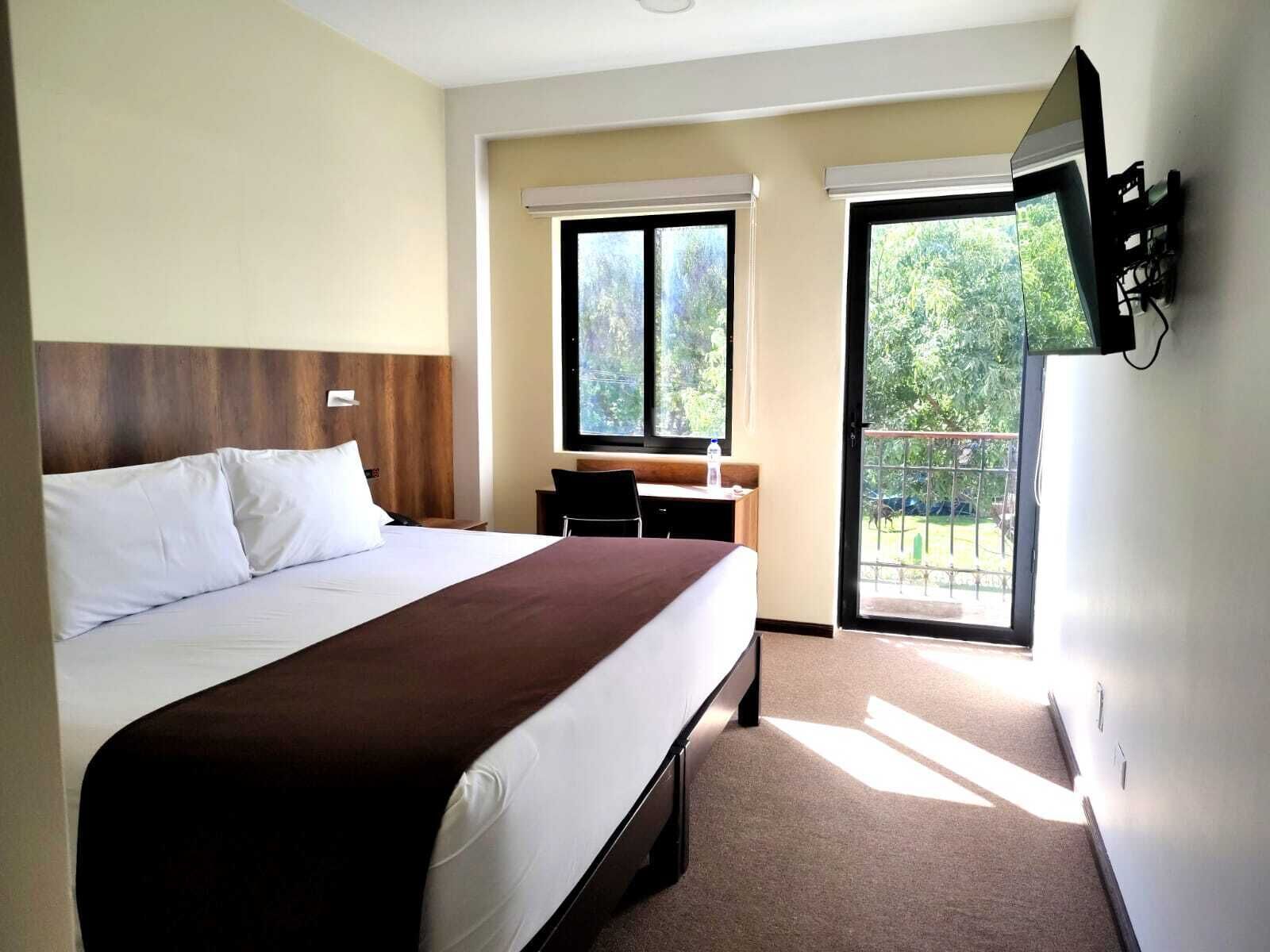 Chambre simple Deluxe, vue sur le jardin, côté jardin | Couette en duvet, minibar, coffre-fort, bureau