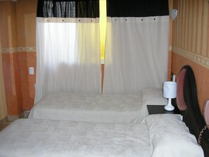 Literie hypoallergénique, surmatelas, coffres-forts dans les chambres
